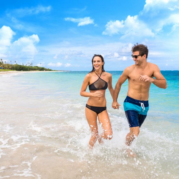 25 Serenity_Beach_CoupleA_RunIng_Ocean_Fun_RGB